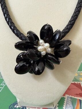 Artisan Black Braided Leather Statement Necklace with Cluster Floral Pendant.